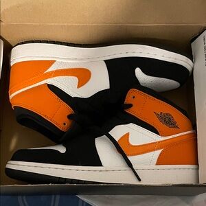 Jordan Kids Black and Orange Sneakers